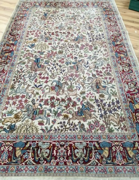 An Isfahan ivory ground pictoral rug (a.f.) 310 x 90cm